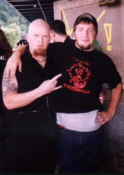 Billy(drummer) and the guy who was in charge of the extras(a.k.a. Dungeon Master). I don't remember his name..maybe it was Brad? He hit me in my nose though...owwww....hehe:)