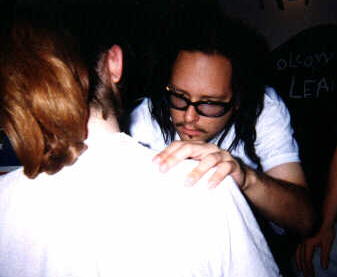 That's a good picture..It looks like he's signing my boob! haha..I was on the verge of tears at this point..