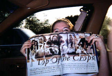 Me showing off my autographs on our drive home.