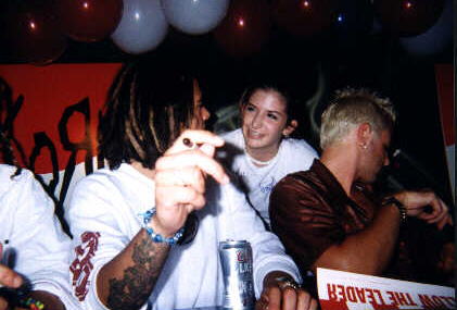 As we gaze into eachother's eyes, we find the souls that were destined to be connected to one another. haha. Actually, he was telling me how he remembered me from Lollapalooza '97 in Virginia..which was EXTREMELY hard for me to believe considering they meet SOOO many people everyday. But he did!! I knew he wasn't shittin, cause he acted out what I did when I met him then.hehe.