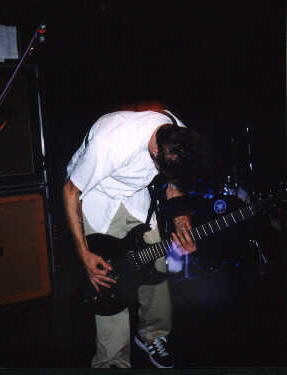 Zac(guitarist)--Simon Says  He's cool to watch when they play.